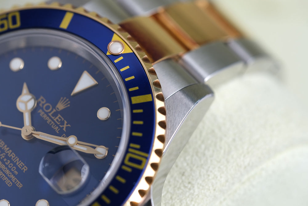 Rolex 2005 UNPOLISHED (Factory Tarnish) SS/18k 16613 Submariner 40mm Blue Dial on Oyster w/ Original Rolex Box & Warranty Papers (Caseback Sticker Intact)